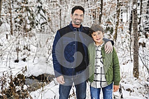 boy and Stepfather on forest in winter season