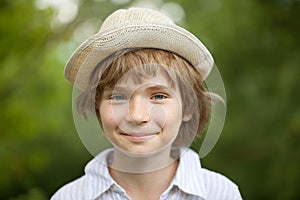 Boy in the striped shirt woven hat