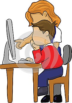 A boy student in front of a computer