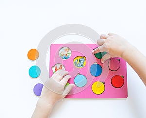 Boy students Child`s hands learning biology with montessori material