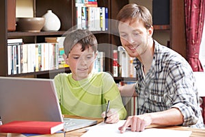 Boy Studying With Home Tutor photo