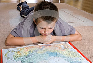 Boy studying a map
