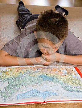 Boy studying a map