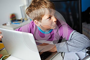 Boy Studying Using Laptop