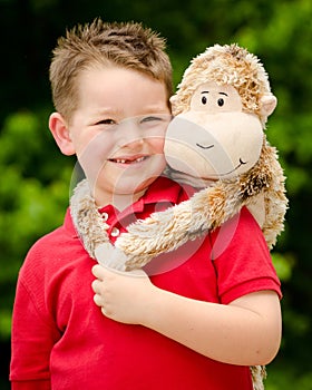 Boy with stuffed animal