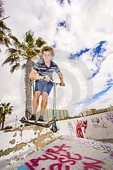 Boy with Stunt Scooter