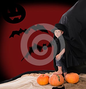 Boy in suit of count Dracula on halloween