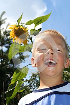 Boy and sunflower