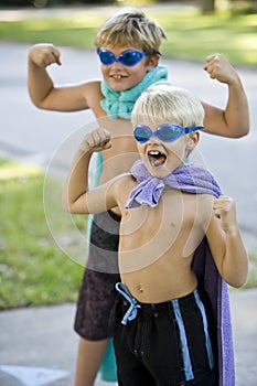 Boy superheroes with mask and cape