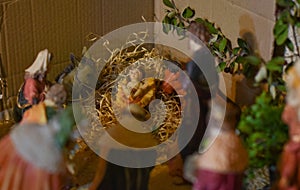 Boy surprised in the manger by men