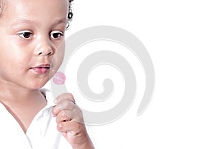 Boy with sweet lollipop stock photo