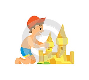 Boy in Swim Trunks and Cap Building Sand Castle