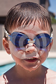 Boy with swimming goggles