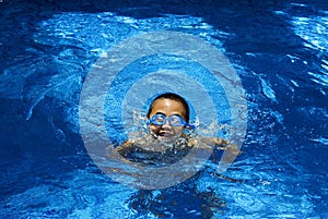 Boy in the swimming pool