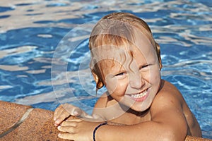 Boy is in the swimming pool