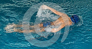 Boy swimming in the pool