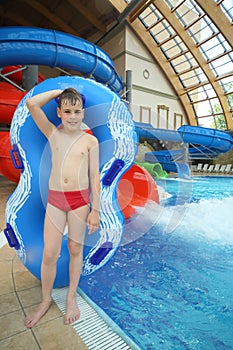 Boy with swimming toy photo