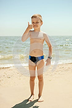 Boy in swimming trunks
