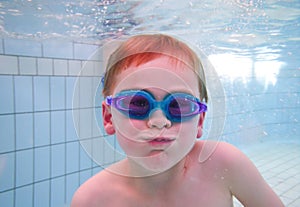 Boy swimming underwater