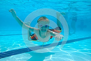 Boy swimming underwater