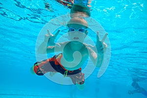 Boy swimming underwater