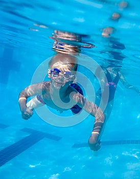 Boy swimming underwater