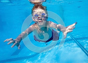 Boy swimming underwater