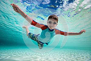 Boy swimming underwater