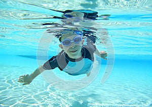 Boy swimming, underwater shot