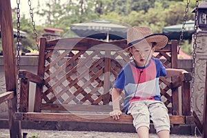 Boy on swing