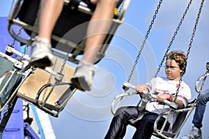 Boy on Swing Ride