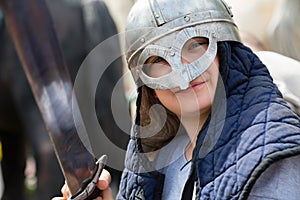 Boy with an sword in a suit Russian soldier