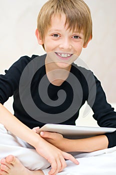 Boy with tablet computer