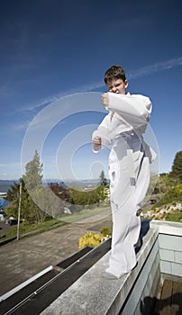 Boy in Tae Kwon Do suit photo