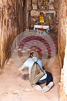 Boy taking picture inside the temple