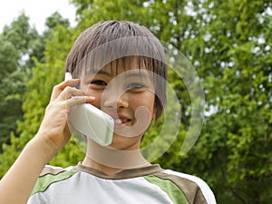 Boy talking with mobile phone