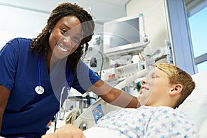 Boy Talking To Female Nurse In Emergency Room