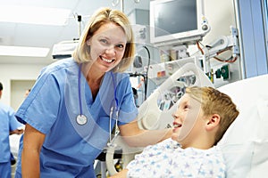 Boy Talking To Female Nurse In Emergency Room