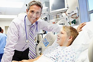 Boy Talking To Male Consultant In Emergency Room