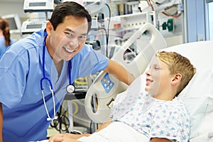 Boy Talking To Male Nurse In Emergency Room