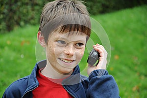 Boy talks on  walkie talkie