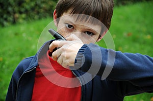 Boy talks on  walkie talkie