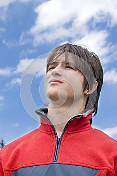 Boy teens looking to blue skies