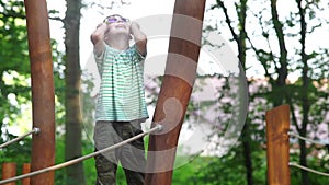 Boy tells a poem while standing on the playground