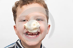 Boy with a test on the nose