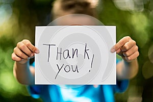 Boy with Thank You sign