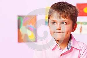 Boy with thinking troubled expression on face