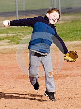 Boy throwing baseball