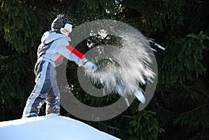 Boy Throwing a Snowball