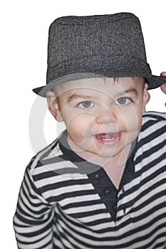 Boy toddler close up wearing hat with big eyes